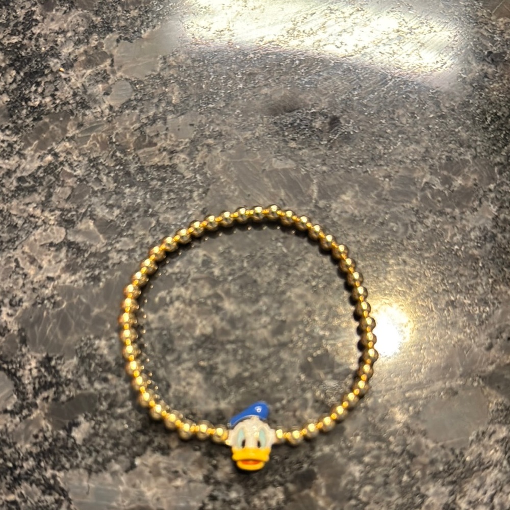 Gold Beaded Baublebar Disney Bracelet with Blue Character Charm